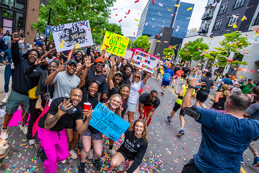 Group of supporters with signs at Run Rock'n'Roll Nashville