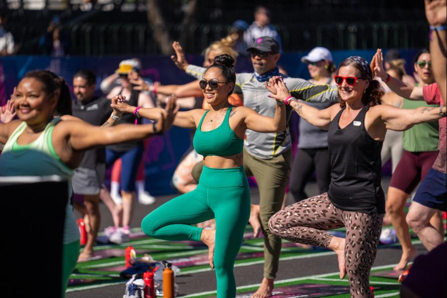 Runners participate in Yoga in the Park